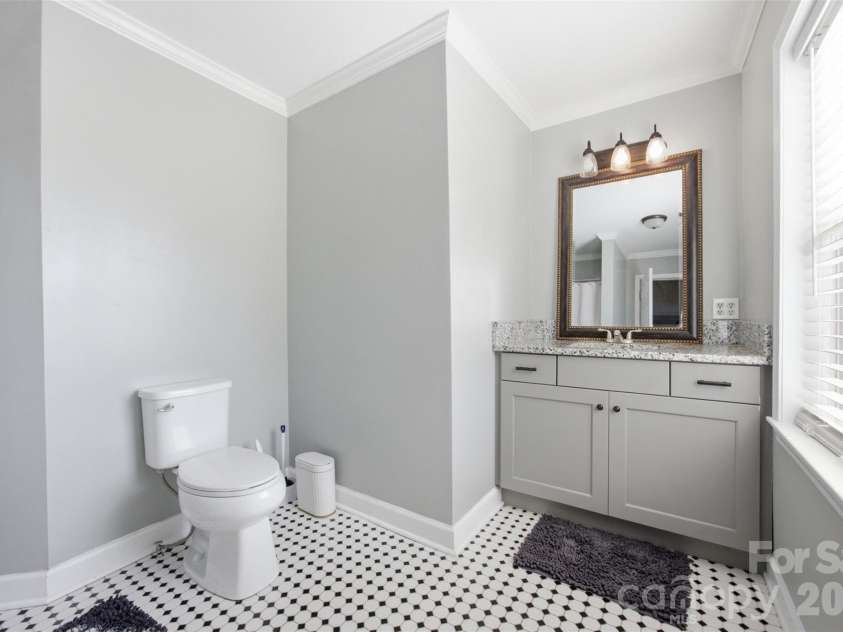 24327 Ridgecrest Road, Locust, NC 28097.  MLS# CAR4393477, YatesRealty ID 31577. Primary bathroom