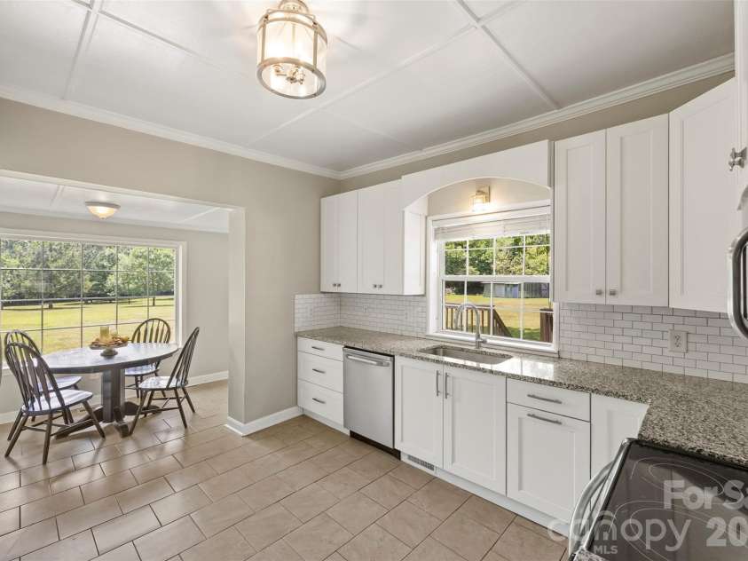 24327 Ridgecrest Road, Locust, NC 28097.  MLS# CAR4393477, YatesRealty ID 31577. Stunning Kitchen!