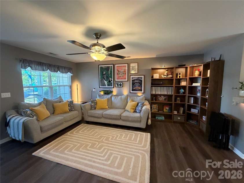 10523 Trolley Run Drive, Cornelius, NC 28031.  MLS# CAR4392718, YatesRealty ID 31578. Cozy Living room