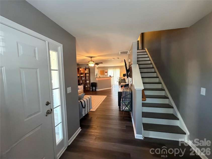 10523 Trolley Run Drive, Cornelius, NC 28031.  MLS# CAR4392718, YatesRealty ID 31578. Entryway and Stairs