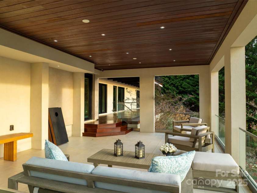 12 Sunset Summit, Asheville, NC 28804.  MLS# CAR4329108, YatesRealty ID 3158. Lower Level Covered Patio acts as an extension to the Living Spaces