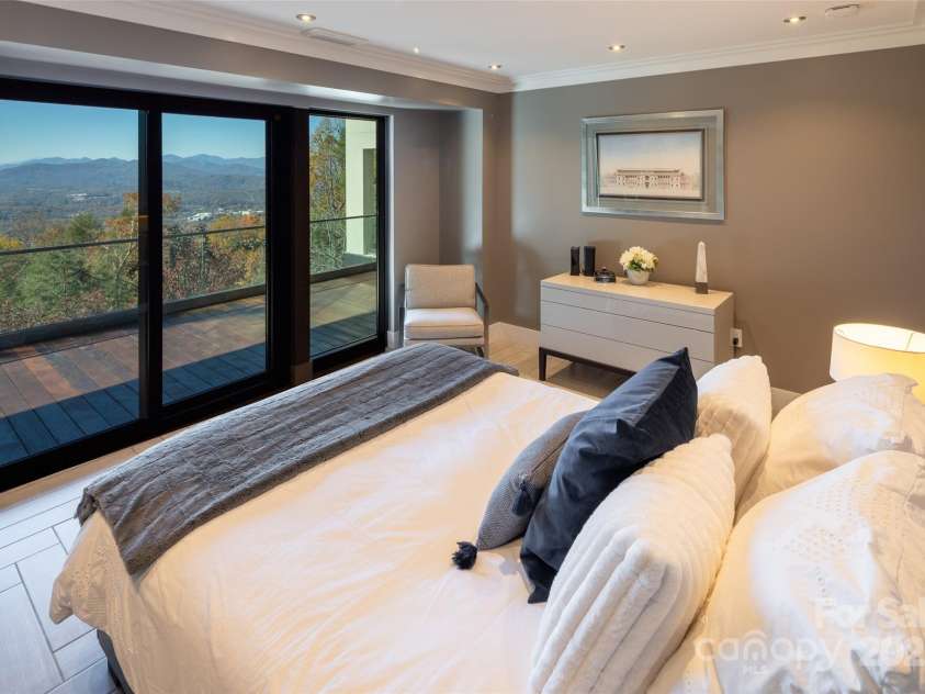 12 Sunset Summit, Asheville, NC 28804.  MLS# CAR4329108, YatesRealty ID 3158. Lower Level Ensuite Bedroom with walk in closet