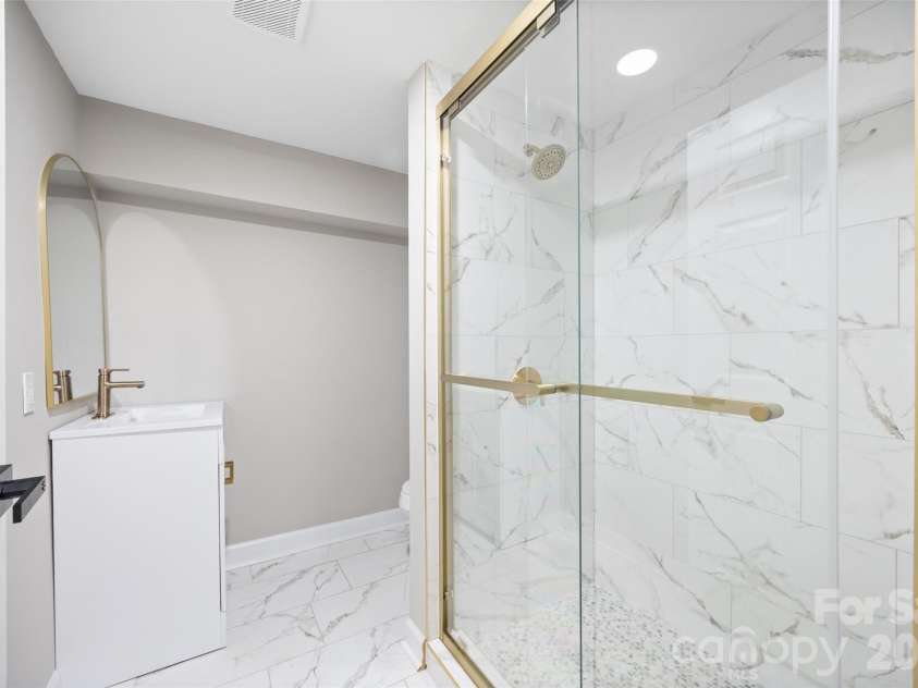 434 Sunnyside Drive, Concord, NC 28025.  MLS# CAR4380840, YatesRealty ID 31584. Basement full bathroom