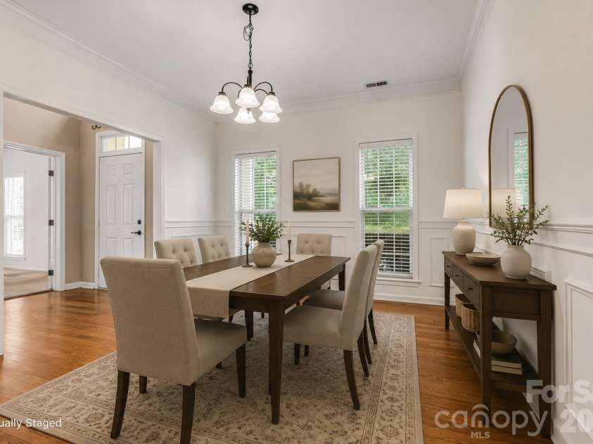 7001 Plough Drive, Mint Hill, NC 28227.  MLS# CAR4391731, YatesRealty ID 31591. Virtually staged dining room