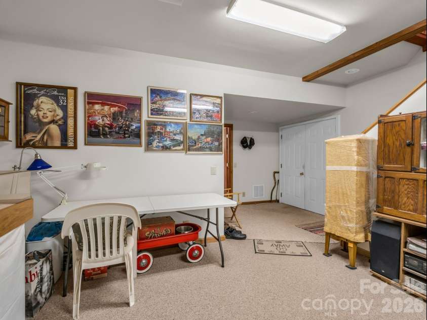 1943 Landrum Road, Columbus, NC 28722.  MLS# CAR4387149, YatesRealty ID 31592. Den/flex lower level off 2 car garage