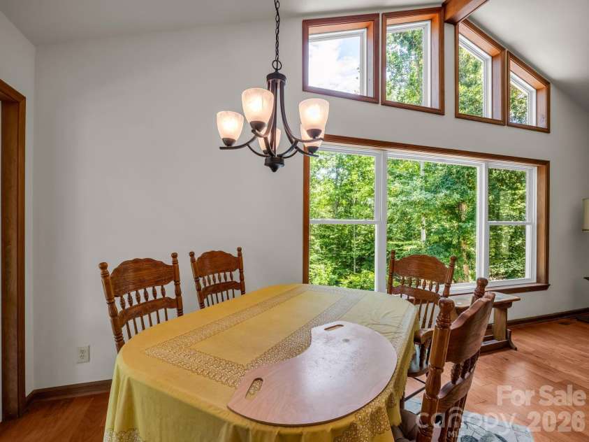 1943 Landrum Road, Columbus, NC 28722.  MLS# CAR4387149, YatesRealty ID 31592. Dining area opens with the natural light