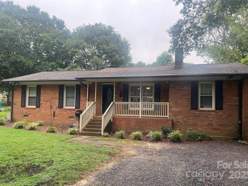 305 Locust Avenue, Locust, NC 28097.  MLS# CAR4288365, YatesRealty ID 31595. 