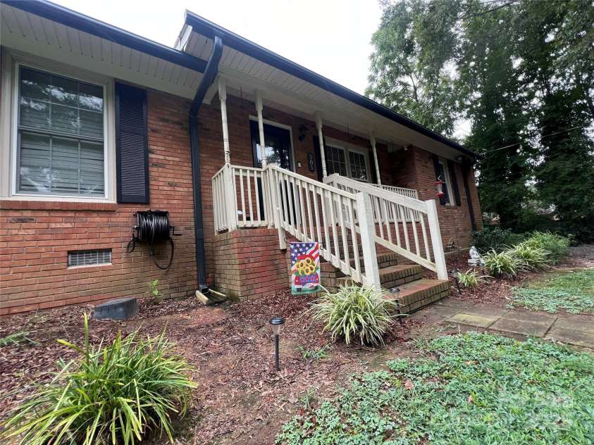 305 Locust Avenue, Locust, NC 28097.  MLS# CAR4288365, YatesRealty ID 31595. 