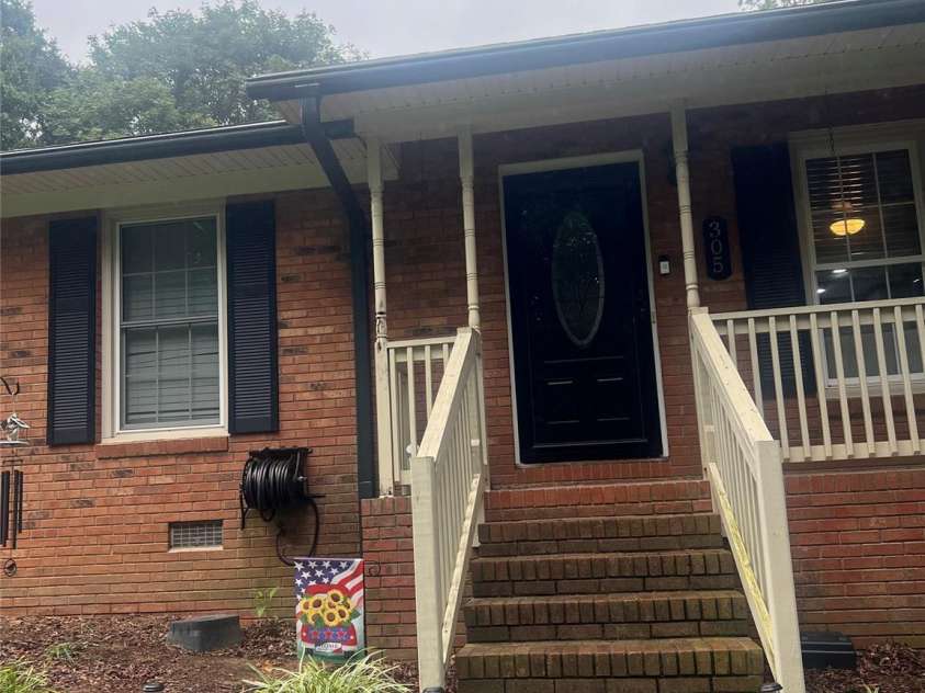 305 Locust Avenue, Locust, NC 28097.  MLS# CAR4288365, YatesRealty ID 31595. 