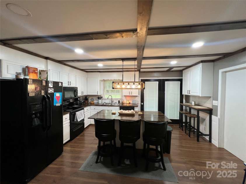 305 Locust Avenue, Locust, NC 28097.  MLS# CAR4288365, YatesRealty ID 31595. 