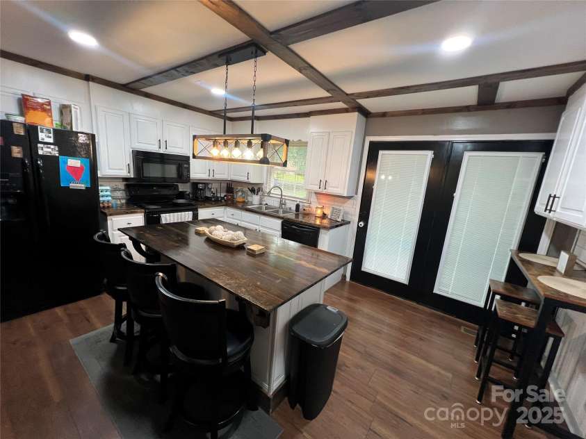 305 Locust Avenue, Locust, NC 28097.  MLS# CAR4288365, YatesRealty ID 31595. 