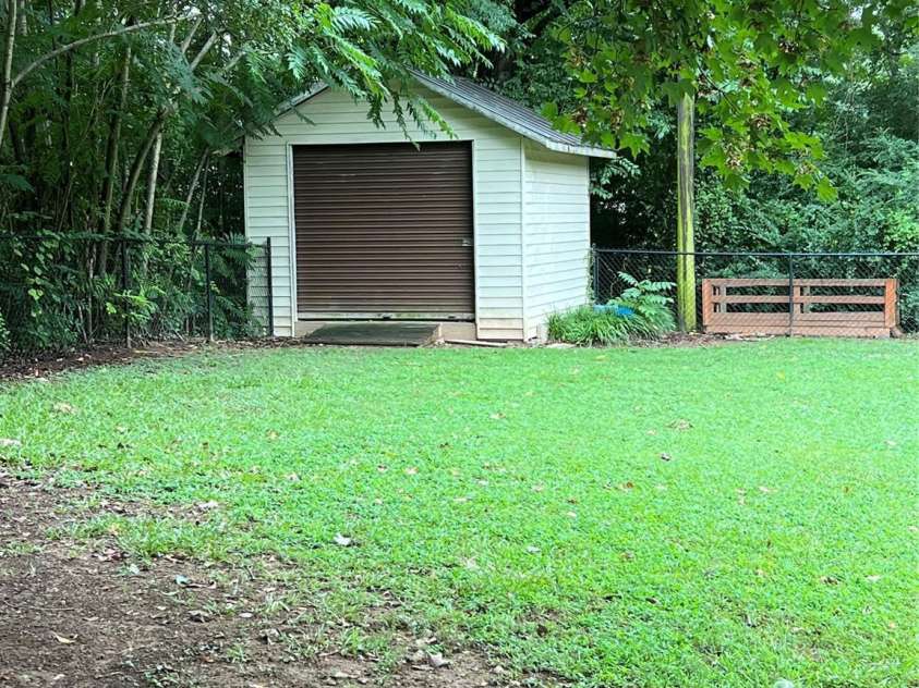 305 Locust Avenue, Locust, NC 28097.  MLS# CAR4288365, YatesRealty ID 31595. 