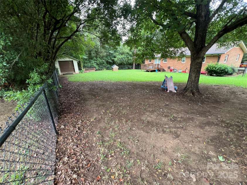 305 Locust Avenue, Locust, NC 28097.  MLS# CAR4288365, YatesRealty ID 31595. 