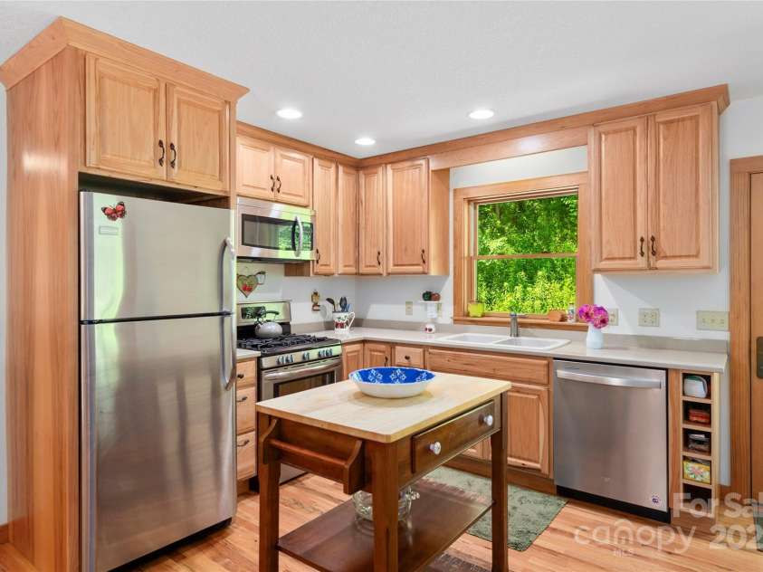 2316 NC 63 Highway, Hot Springs, NC 28743.  MLS# CAR4278288, YatesRealty ID 3160. Solid wood hickory cabinets to ceiling 
