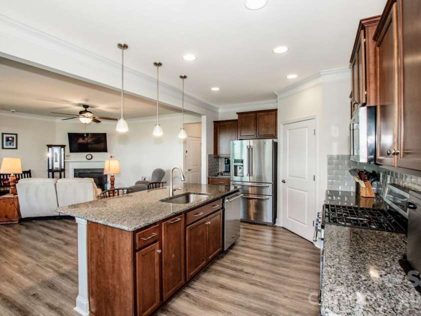 122 Coddle Way, Mooresville, NC 28115.  MLS# CAR4370294, YatesRealty ID 31603. Kitchen is open to Living Room