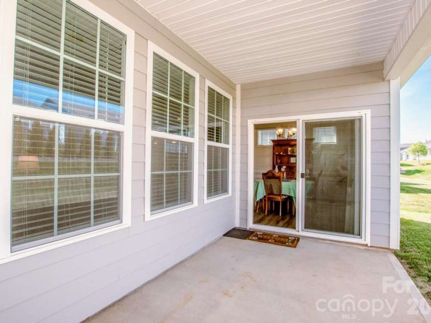 122 Coddle Way, Mooresville, NC 28115.  MLS# CAR4370294, YatesRealty ID 31603. Rear Porch looking into Dining Room