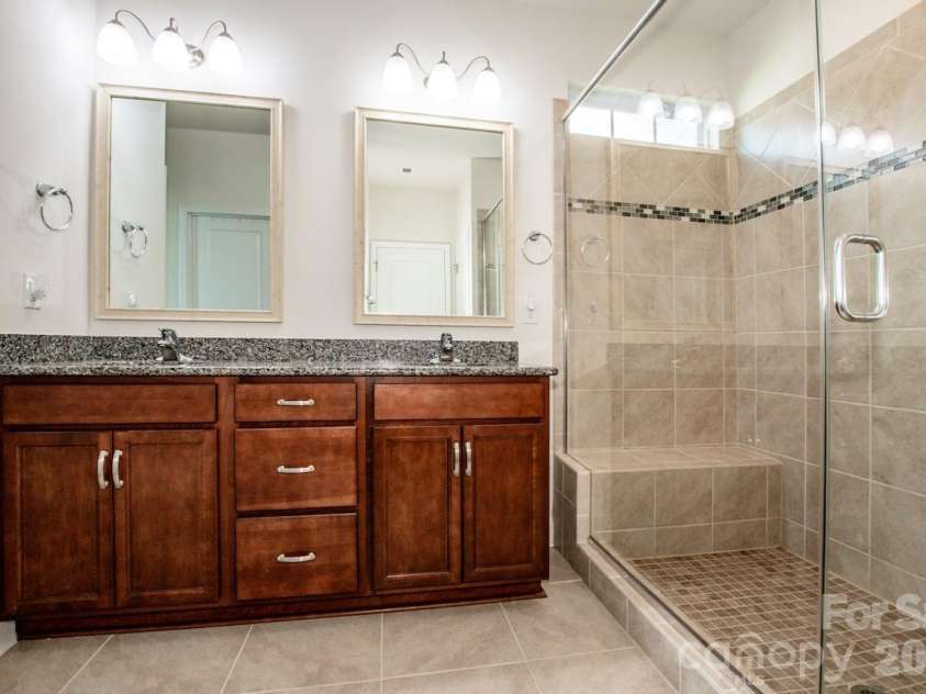 122 Coddle Way, Mooresville, NC 28115.  MLS# CAR4370294, YatesRealty ID 31603. Tall vanity, two sinks and framed mirrors!