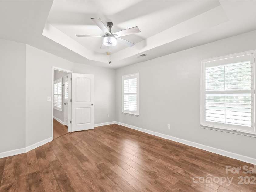 8513 Loxton Circle, Charlotte, NC 28214.  MLS# CAR4226710, YatesRealty ID 31606. Another view of the primary bedroom without furniture.