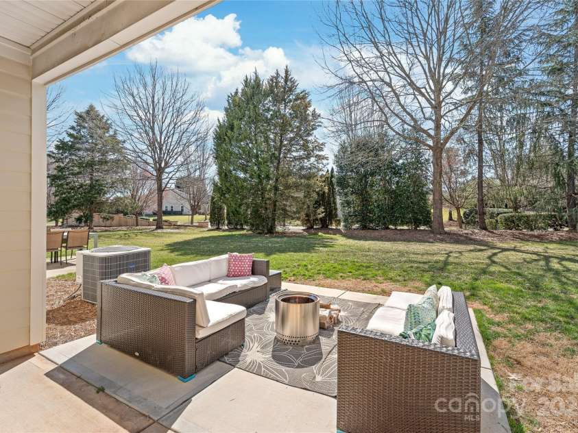 8513 Loxton Circle, Charlotte, NC 28214.  MLS# CAR4226710, YatesRealty ID 31606. Covered patio with new extended patio.