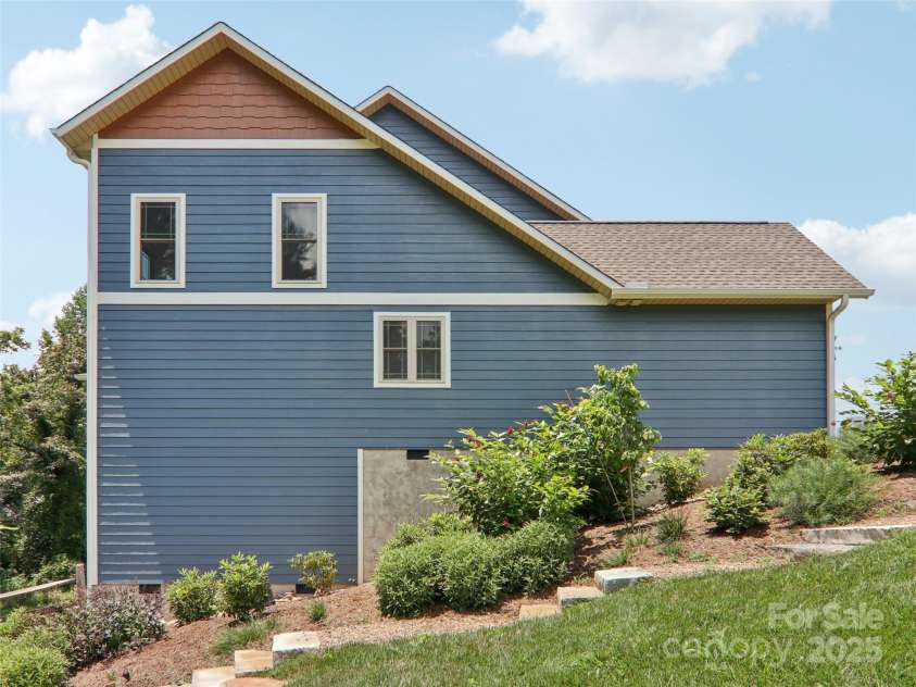 278 Ollie Weaver Road, Weaverville, NC 28787.  MLS# CAR4275482, YatesRealty ID 31609. Left Side of Home