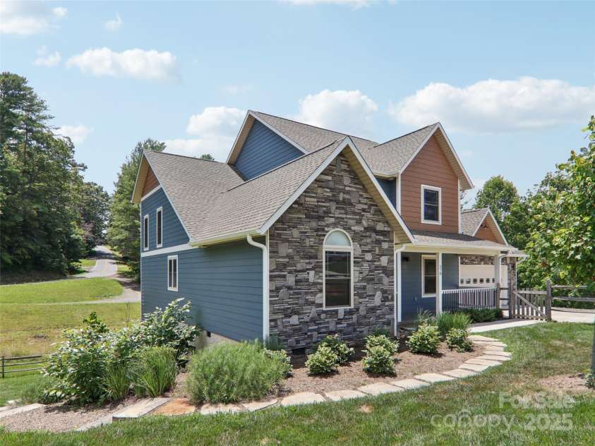 278 Ollie Weaver Road, Weaverville, NC 28787.  MLS# CAR4275482, YatesRealty ID 31609. Side of Home