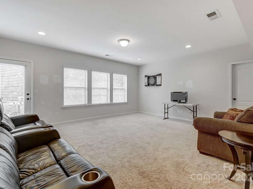 7006 Garden Hill Drive, Huntersville, NC 28078.  MLS# CAR4196907, YatesRealty ID 3161. Basement Family Room