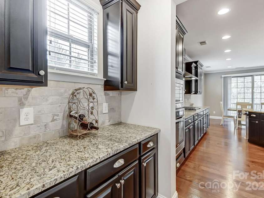 7006 Garden Hill Drive, Huntersville, NC 28078.  MLS# CAR4196907, YatesRealty ID 3161. Butler's Pantry