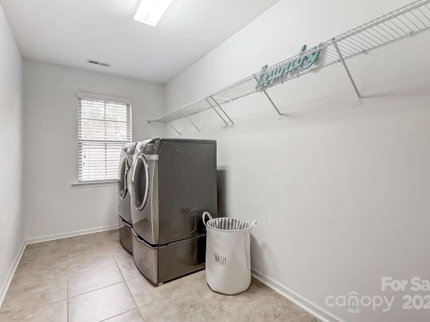 7006 Garden Hill Drive, Huntersville, NC 28078.  MLS# CAR4196907, YatesRealty ID 3161. Laundry Room