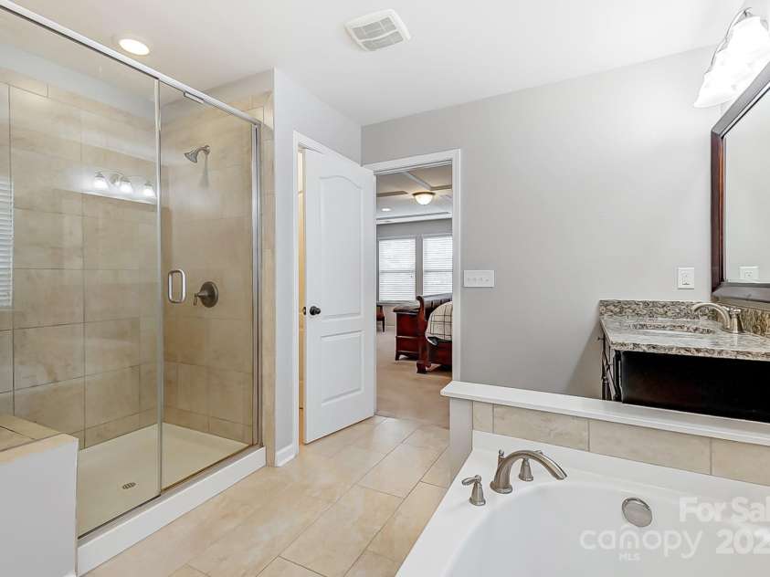 7006 Garden Hill Drive, Huntersville, NC 28078.  MLS# CAR4196907, YatesRealty ID 3161. Owner's Bathroom