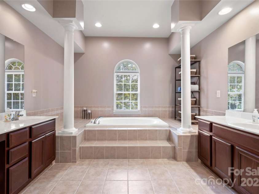 2216 Potter Cove Lane, Weddington, NC 28104.  MLS# CAR4291105, YatesRealty ID 31611. Master bath