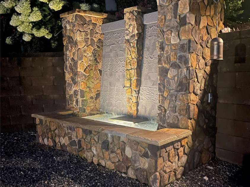 2216 Potter Cove Lane, Weddington, NC 28104.  MLS# CAR4291105, YatesRealty ID 31611. Water feature at night