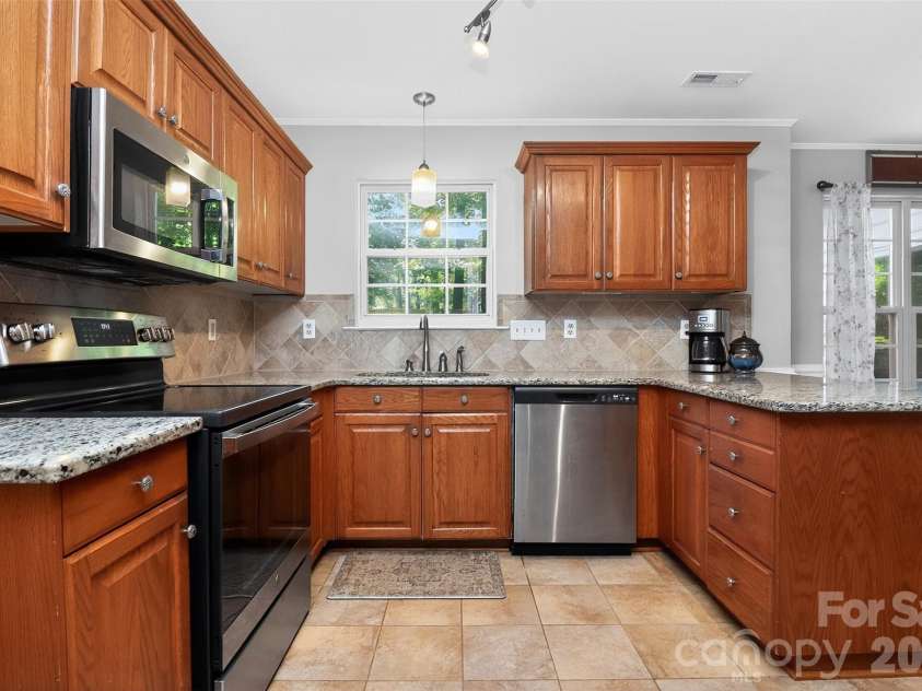 11007 Secotan Lane, Matthews, NC 28105.  MLS# CAR4393288, YatesRealty ID 31622. 