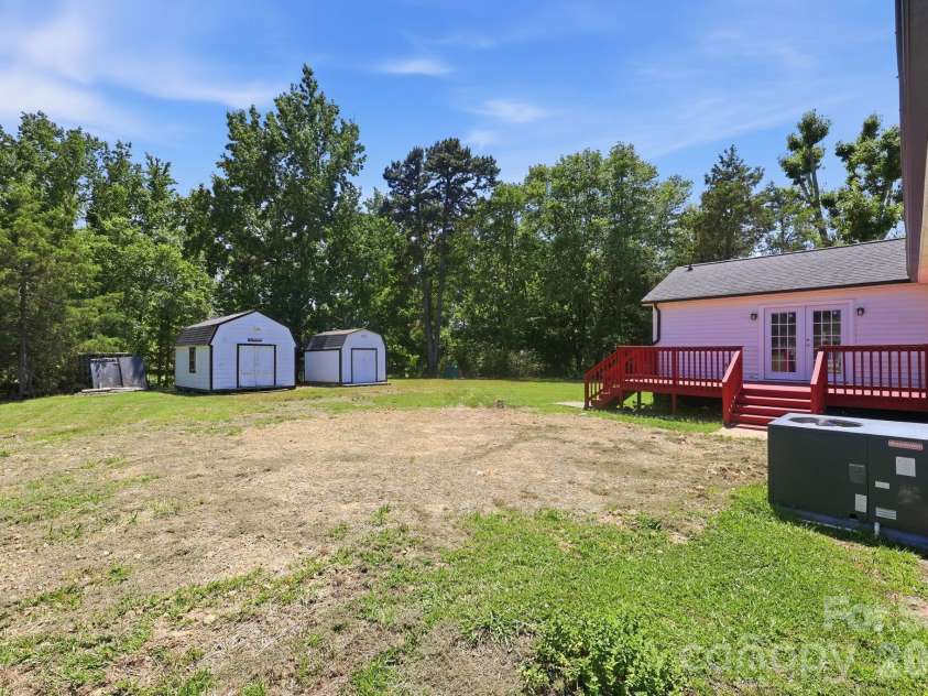 2964 Lane Street, Kannapolis, NC 28083.  MLS# CAR4394335, YatesRealty ID 31624. Huge Backyard with 2 storages