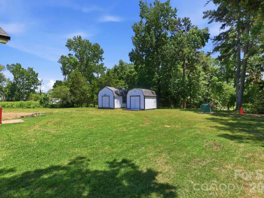 2964 Lane Street, Kannapolis, NC 28083.  MLS# CAR4394335, YatesRealty ID 31624. Huge Backyard with 2 storages