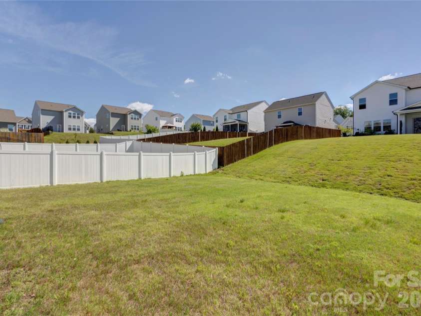 6319 Clarisse Drive, Concord, NC 28025.  MLS# CAR4393994, YatesRealty ID 31625. Great back yard