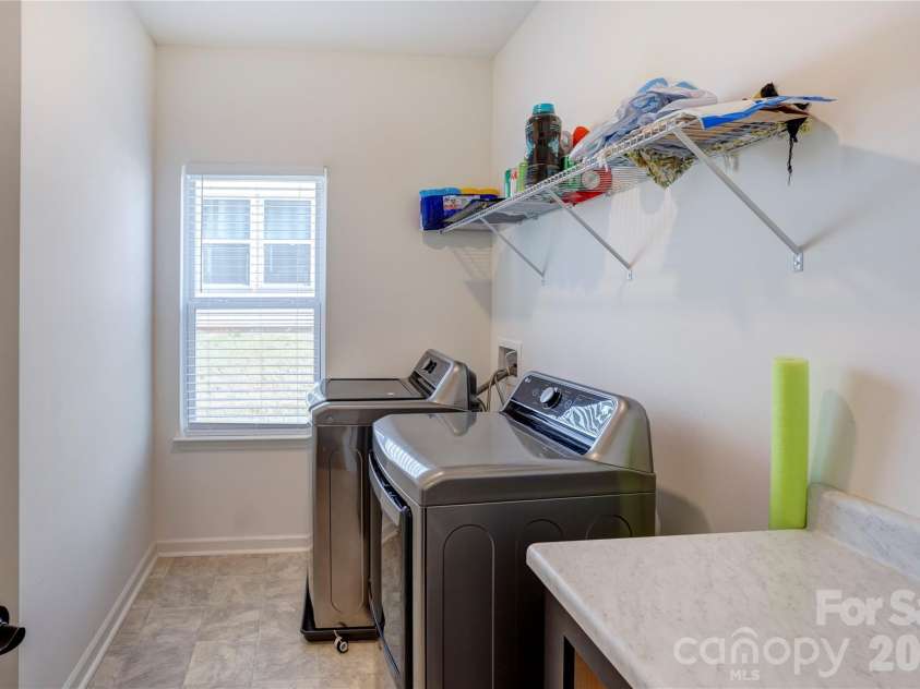 6319 Clarisse Drive, Concord, NC 28025.  MLS# CAR4393994, YatesRealty ID 31625. Laundry room on main floor