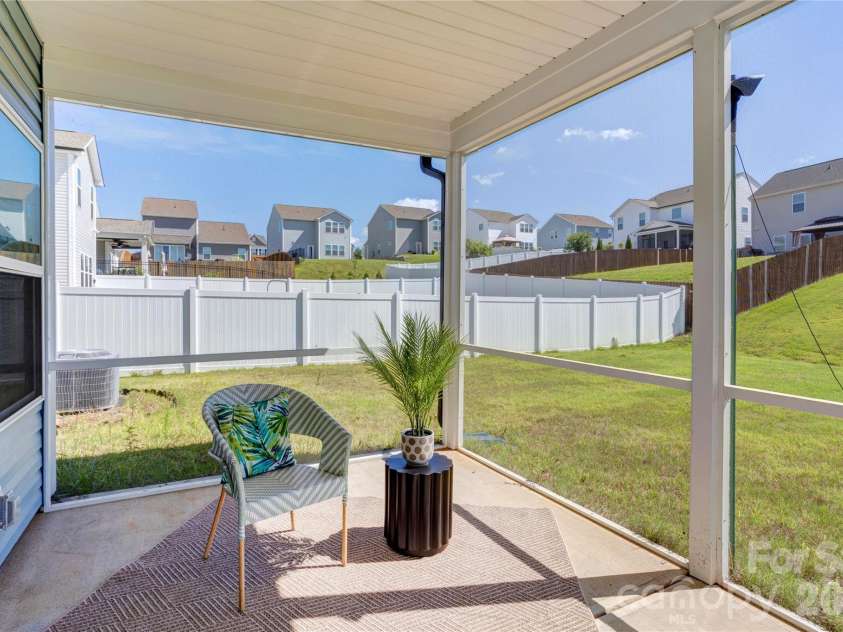 6319 Clarisse Drive, Concord, NC 28025.  MLS# CAR4393994, YatesRealty ID 31625. Screened back patio