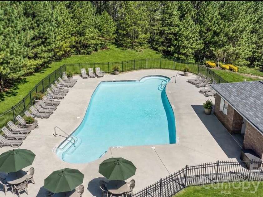 156 Crooked Branch Way, Troutman, NC 28166.  MLS# CAR4393764, YatesRealty ID 31626. Community Pool