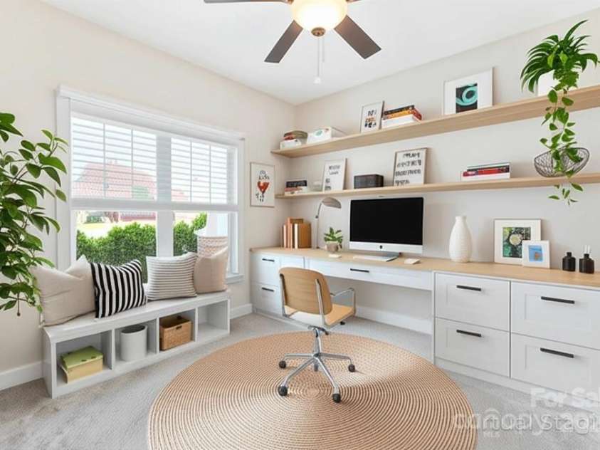 509 Garner Drive, Salisbury, NC 28146.  MLS# CAR4287549, YatesRealty ID 31626. **VIRTUAL STAGING** showing an idea of an office possibility in the Office/Hobby flex space