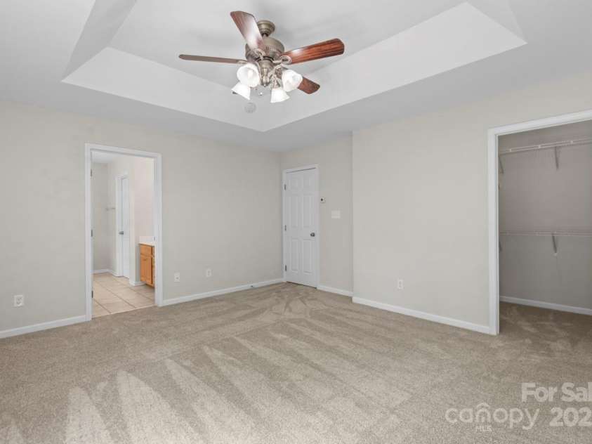 104 Arcadian Way, Mooresville, NC 28117.  MLS# CAR4288099, YatesRealty ID 31627. Large primary bedroom with walk in closet