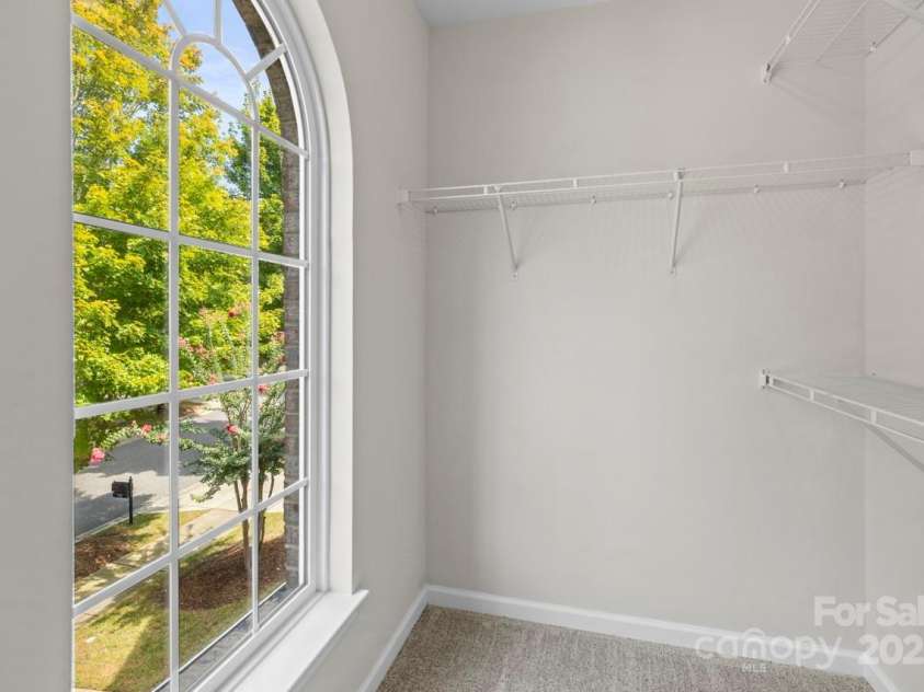 104 Arcadian Way, Mooresville, NC 28117.  MLS# CAR4288099, YatesRealty ID 31627. Palladian window in the 2nd bedroom closet