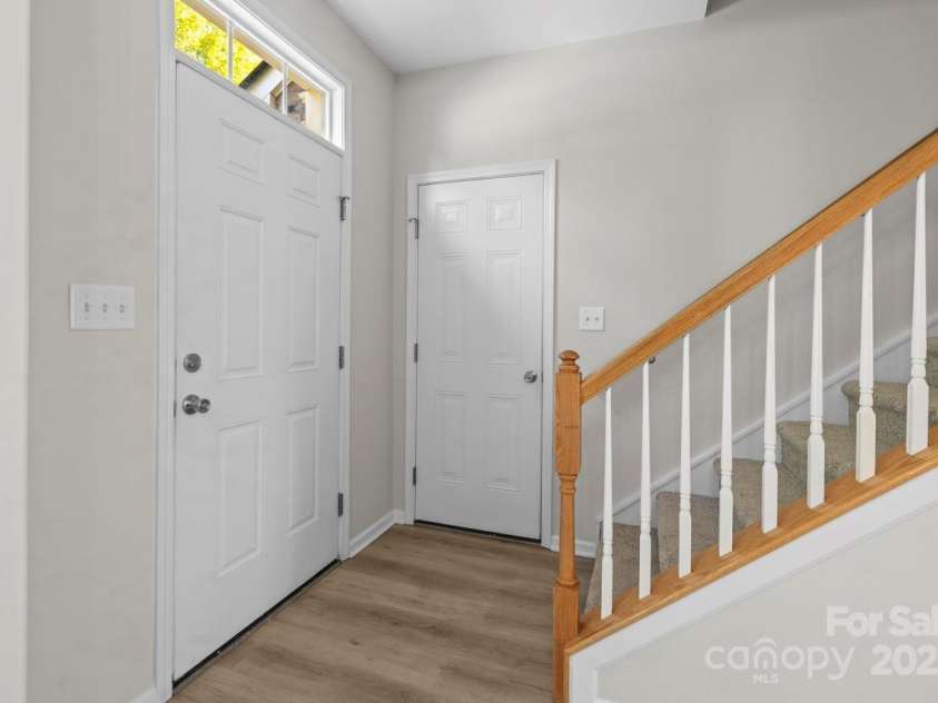 104 Arcadian Way, Mooresville, NC 28117.  MLS# CAR4288099, YatesRealty ID 31627. Transom window above the front door
