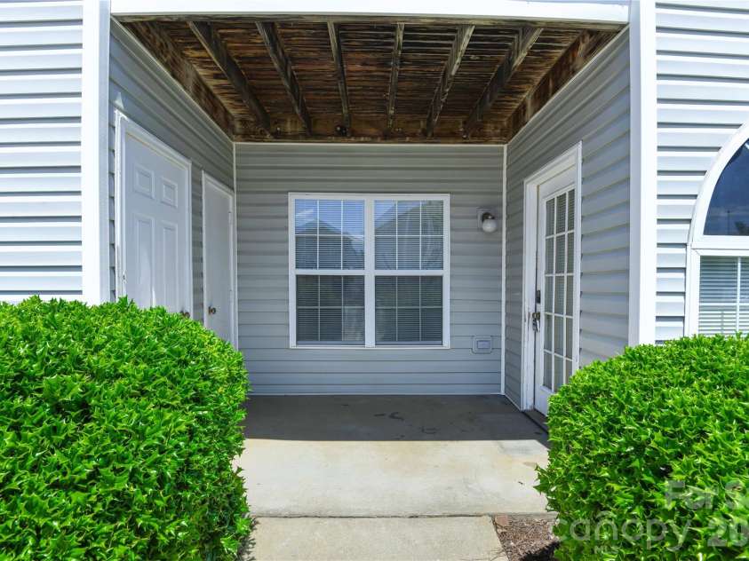 5008 Lawndale Drive, Greensboro, NC 27455.  MLS# CAR4395458, YatesRealty ID 31633. Covered Patio