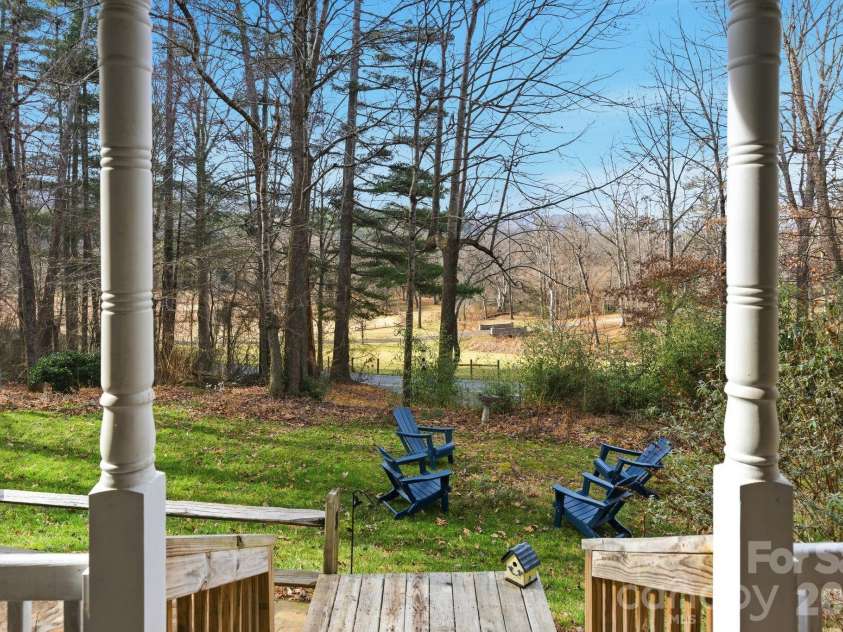 72 Lacey Lane, Hendersonville, NC 28739.  MLS# CAR4308230, YatesRealty ID 3164. Front Porch (looking west toward the French Broad river)