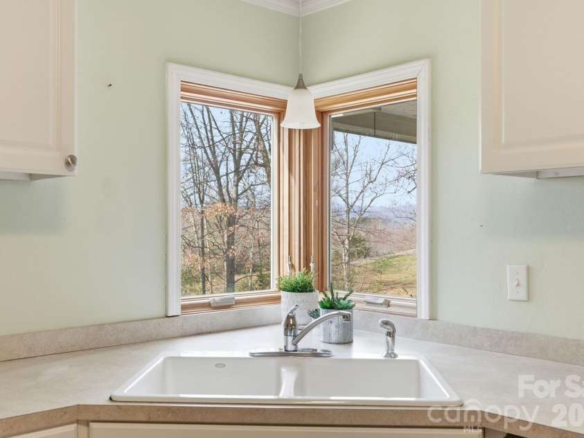 72 Lacey Lane, Hendersonville, NC 28739.  MLS# CAR4308230, YatesRealty ID 3164. Kitchen (looking NW)