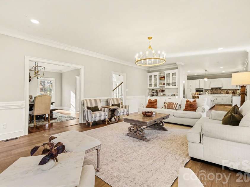 9908 Colvard Circle, Charlotte, NC 28269.  MLS# CAR4332495, YatesRealty ID 3164. Living Room open to Kitchen and Dining area