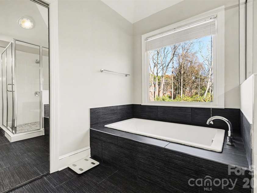 9908 Colvard Circle, Charlotte, NC 28269.  MLS# CAR4332495, YatesRealty ID 3164. Primary Bath separate Tub/Shower