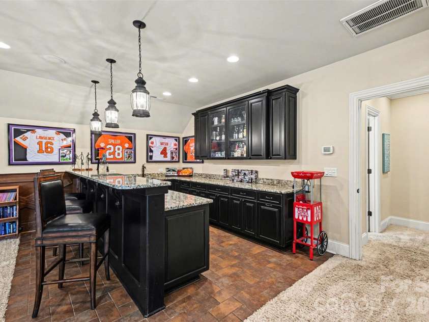 295 Bent Tree Drive, Stanley, NC 28164.  MLS# CAR4356670, YatesRealty ID 31642. Upstairs - Bonus/Rec Bar