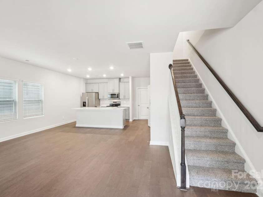 125 UTILITY Lane, Mooresville, NC 28117.  MLS# CAR4286424, YatesRealty ID 31643. Photo is not of the actual home, but is an inspirational photo of builder’s model home and may depict options, furnishings, and/or decorator features that are not included