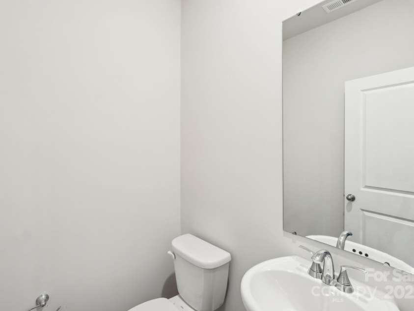125 UTILITY Lane, Mooresville, NC 28117.  MLS# CAR4286424, YatesRealty ID 31643. Photo is not of the actual home, but is an inspirational photo of builder’s model home and may depict options, furnishings, and/or decorator features that are not included